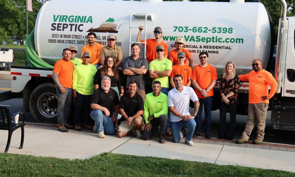 Workers of Virginia Septic group photo with truck