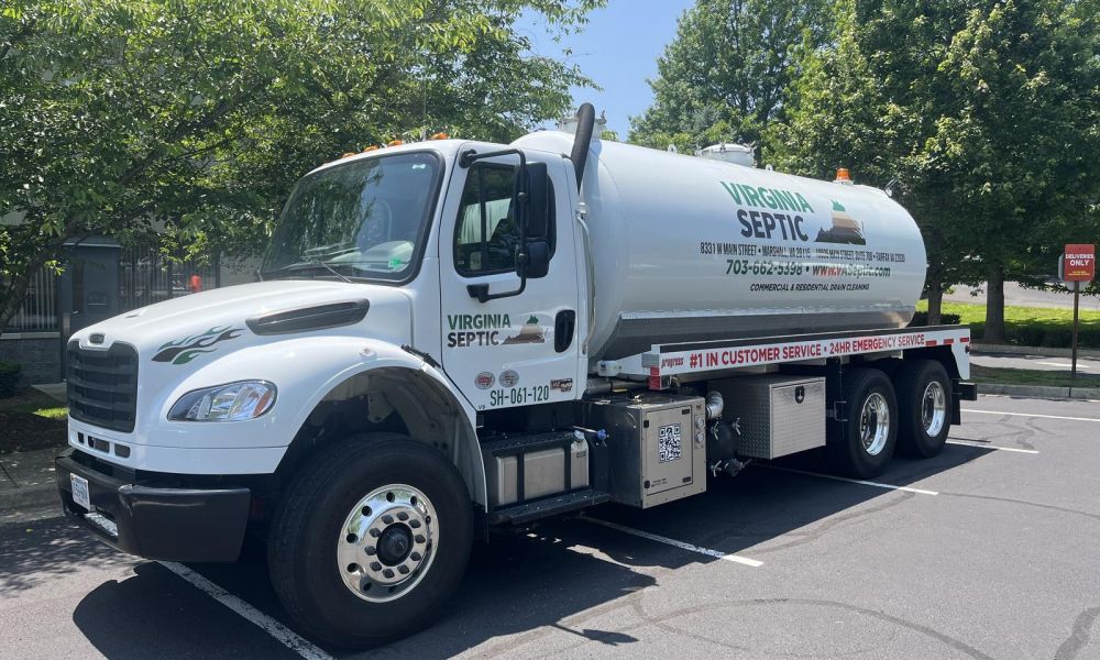 Virginia Septic truck in parking lot with trees nearby